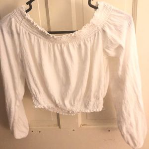 Long sleeve cropped off the shoulder